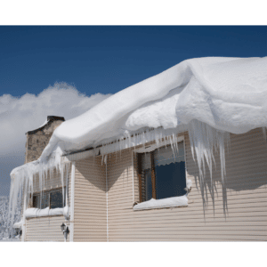 House covered with snow and icicles