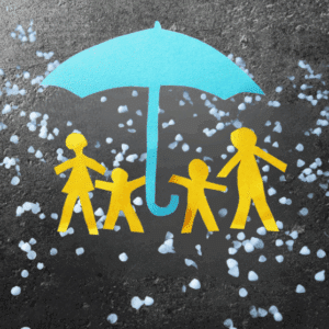 Paper cutouts of a family of four stand under a blue paper umbrella, shielding them from falling white hailstones on a dark background—prompting the question: Does Car Insurance Cover Hail Damage?.